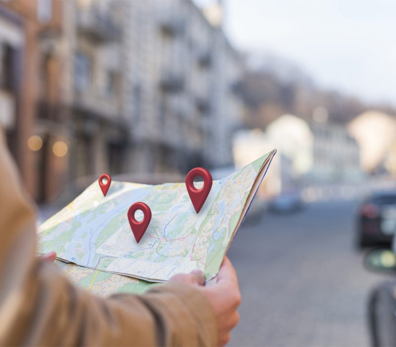 side-view-hands-holding-map